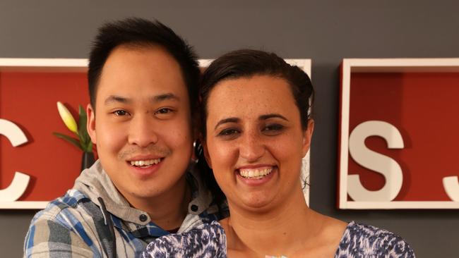 Block contestants Chris Susetio and Jenna Susetio at their home in Campbelltown. Chris and Jenna are pictured at home protecting a pile of cash for a story about income protection and protecting your most valuable asset being your income.