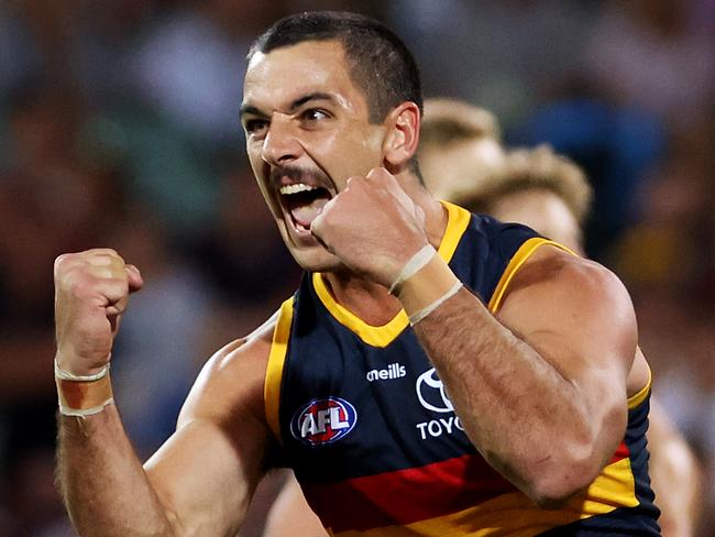 ADELAIDE, AUSTRALIA - APRIL 02: Taylor Walker of the Crows celebrates a goal during the 2021 AFL Round 03 match between the Adelaide Crows and the Gold Coast Suns at Adelaide Oval on April 02, 2021 in Adelaide, Australia. (Photo by James Elsby/AFL Photos via Getty Images)