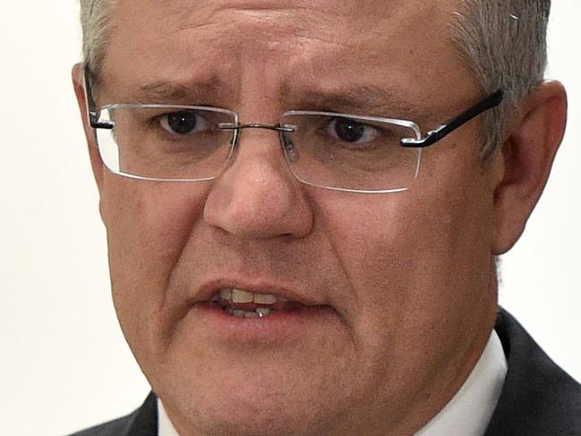 Federal Tresaurer Scott Morrison speaks to the media in Melbourne, Wednesday, June 15, 2016. Morrison was launching a new ad highlighting the possibility of a Greens and Labor minority government. (AAP Image/Julian Smith) NO ARCHIVING