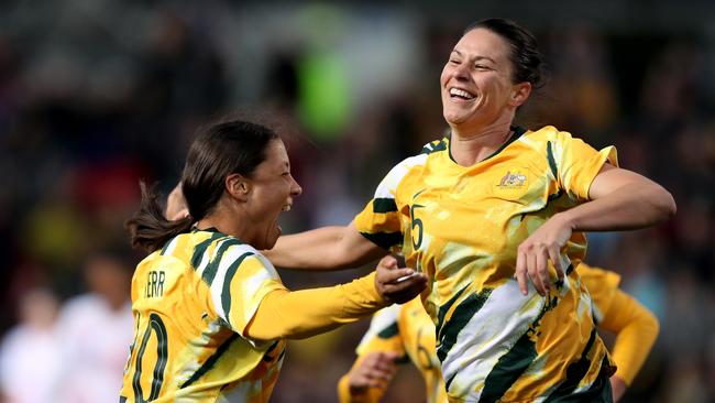 Gielnik on the pitch with Sam Kerr in a friendly match against Chile in 2019. Picture: AAP