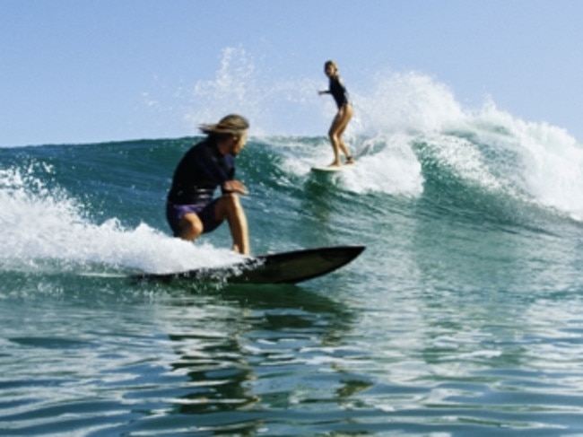 Dave Rastovich and Stephanie Gilmore are filmed riding the waves in Mexico.