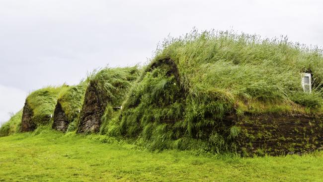 An old fashioned Icelandic house with a turf roof