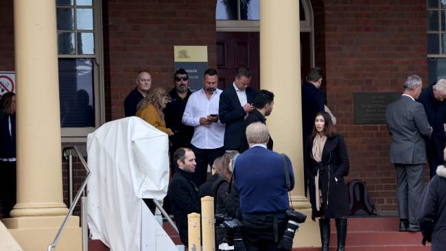 Mr Button's loved ones were by his side as he fronted court on Tuesday. They were seen letting out a sigh of relief and wiping away tears after being granted bail. Picture: NCA NewsWire / Damian Shaw