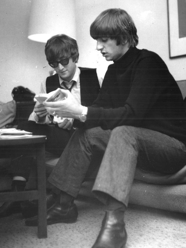 John Lennon and Ringo Starr relax in a motel room in Melbourne. Picture: Herald Sum Image Library