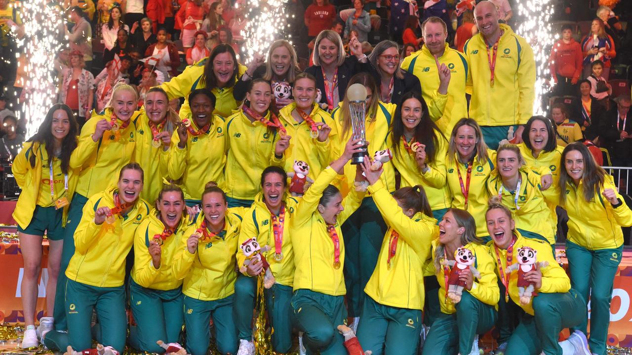 Marinkovich (back row, centre) celebrates with players after the Diamonds beat England to win the World Cup in 2023. Picture: AFP