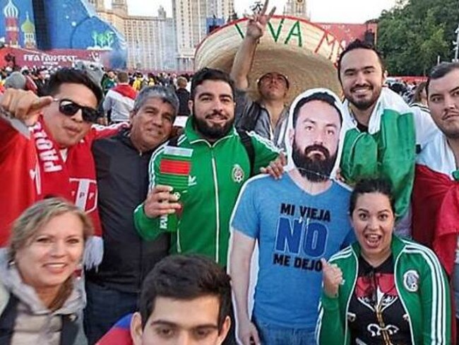 Mexican fans carry a cardboard cut-out of their friend, Javier.