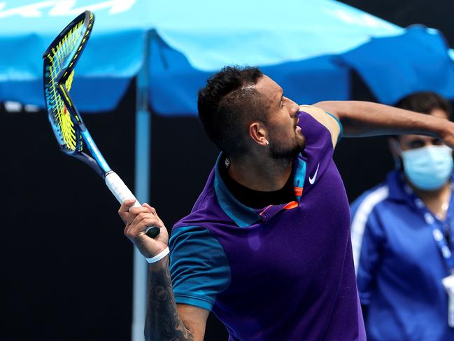 Australia's Nick Kyrgios smashes his racket after losing a point against Croatia's Borna Coric during their Murray River Open men's singles tennis match in Melbourne on February 5, 2021. (Photo by David Gray / AFP) / -- IMAGE RESTRICTED TO EDITORIAL USE - STRICTLY NO COMMERCIAL USE --