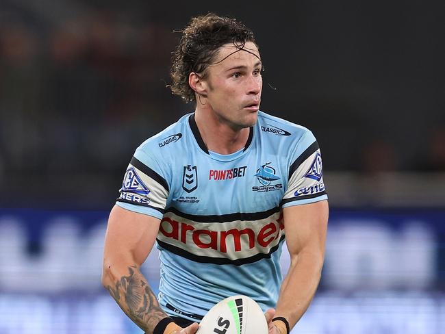 PERTH, AUSTRALIA - AUGUST 05: Nicholas Hynes of the Sharks runs the ball during the round 23 NRL match between South Sydney Rabbitohs and Cronulla Sharks at Optus Stadium on August 05, 2023 in Perth, Australia. (Photo by Paul Kane/Getty Images)