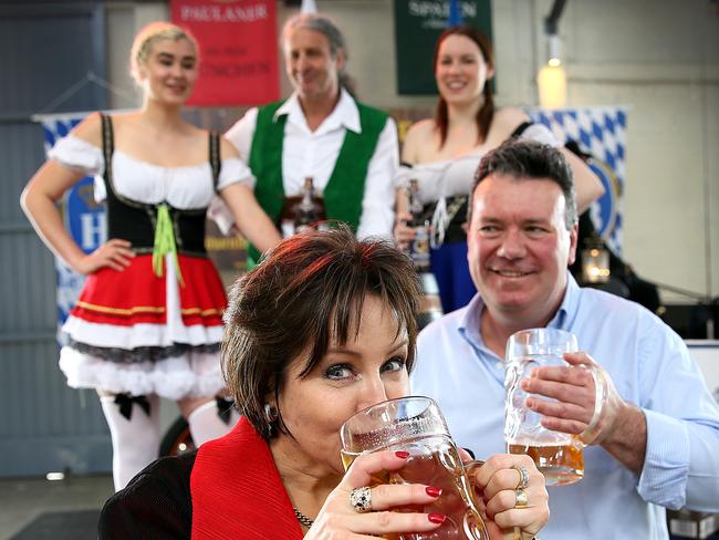 Hobart Lord Mayor Sue Hickey tries a beer from the first keg she tapped to officially open Oktoberfest, with Oktoberfest organiser Tony Kennedy, at Princes Wharf in Salamanca. Picture: SAM ROSEWARNE.