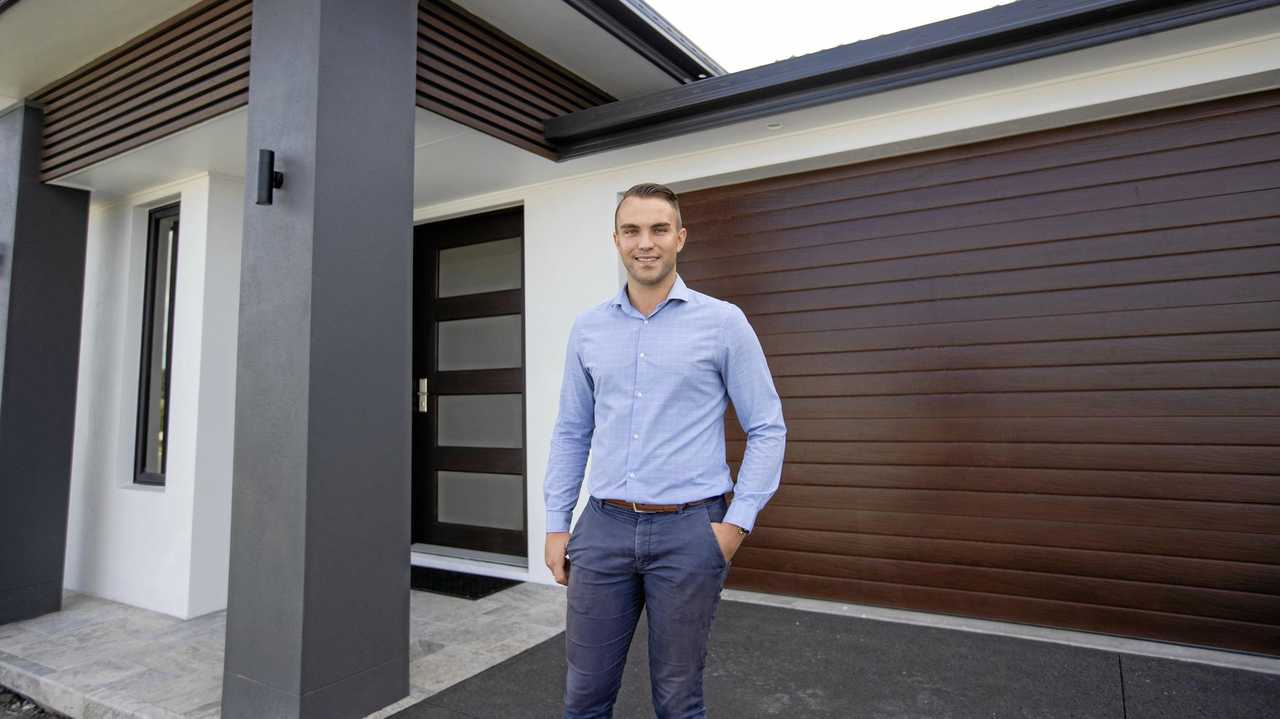 NEW HOME: Andrew Walker and his partner Taize are the 300th residents to call the Harmony Community in Palmview home. Picture: Contributed