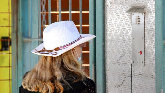 Entrance to the Southport Watchhouse — a lawyer waits for a client. Picture: NCA NewsWire / David Clark.