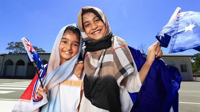 Irha Shoaib and Rizwana Hadi get ready for Australia Day. Picture: Adam Head