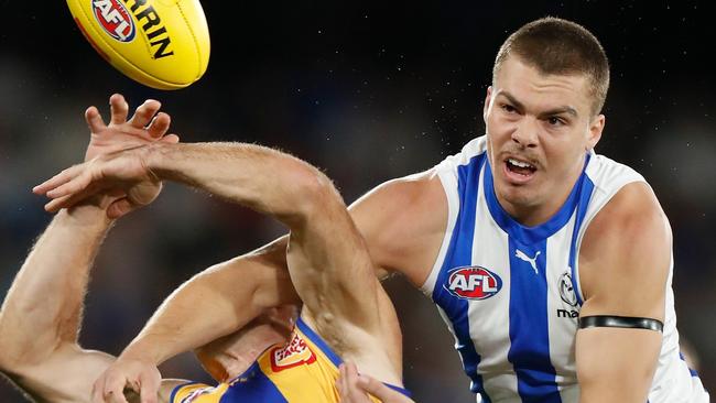 Cam Zurhaar makes sure Shannon Hurn earns the footy the hard way. Picture: Michael Willson AFL Photos