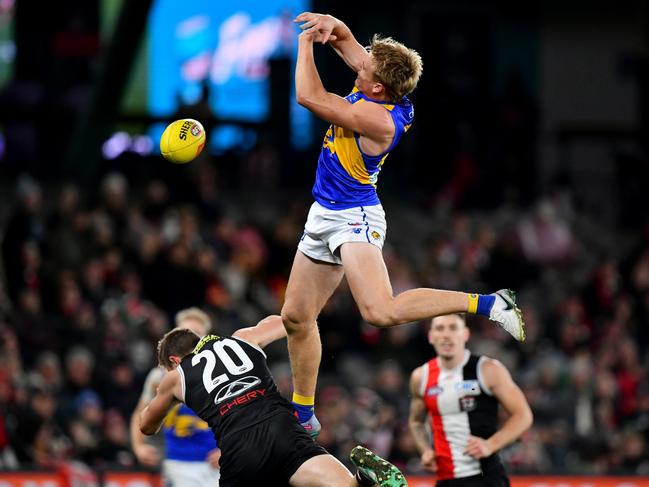 Jack Hutchinson of the Eagles soars but failed to hold the grab. Picture: Josh Chadwick/AFL Photos/via Getty Images.