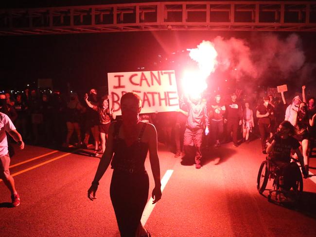 People march from the George Floyd vigil at Peninsula Park towards the Justice Center downtown in Portland. Picture: Dave Killen