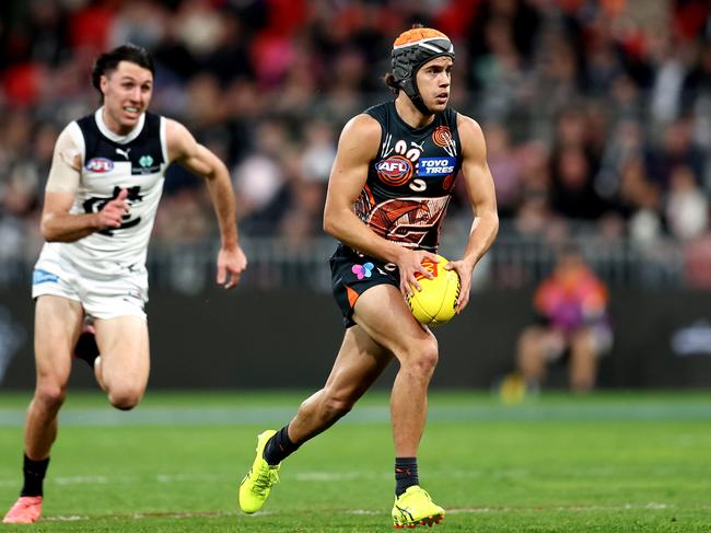 SYDNEY, AUSTRALIA - JULY 06: Darcy Jones of the Giants controls the ball during the round 17 AFL match between Greater Western Sydney Giants and Carlton Blues at ENGIE Stadium, on July 06, 2024, in Sydney, Australia. (Photo by Brendon Thorne/AFL Photos/via Getty Images)