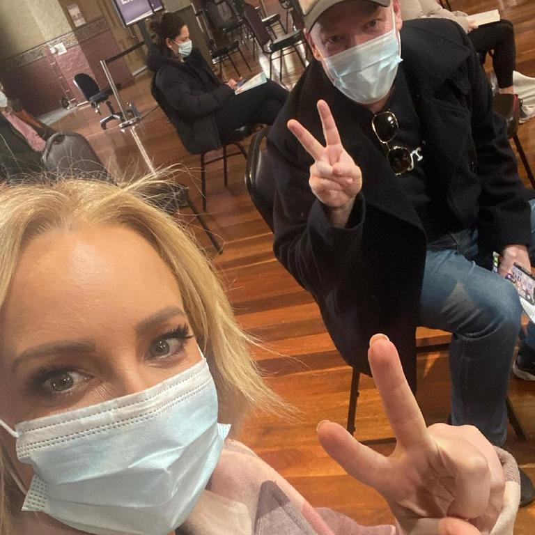 Carrie Bickmore and Peter Helliar went together to get their first vaccine dose in June.