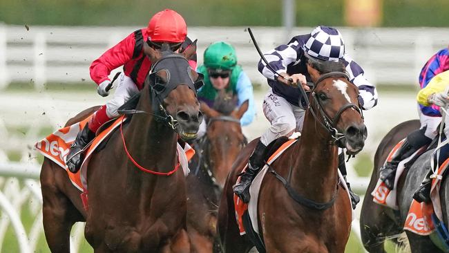 Rule The World (left) holds off Grinzinger Allee at Caulfield. Picture: Getty Images