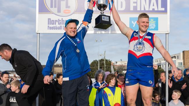 Steve Saddington (left) celebrates North Heidelberg's NFL Division 2 flag in 2017. Picture: Nathan McNeill