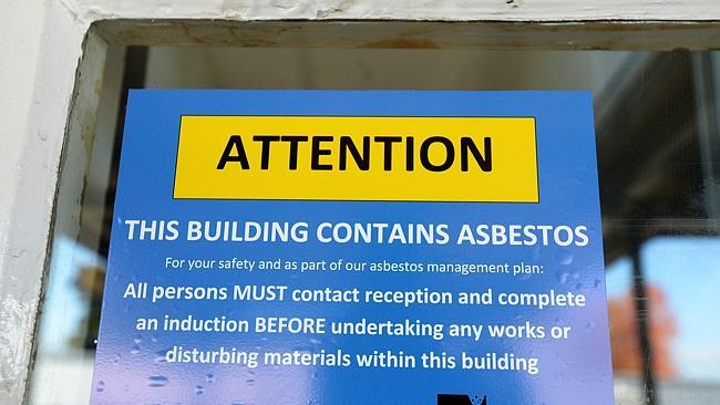 A warning sign relating to asbestos at the school. Picture: Steve Tanner