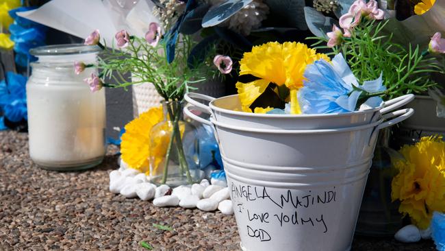 A memorial was set up at the scene of a fatal stabbing of a 36-year-old Wadeye man outside the Cavenagh St Woolworths supermarket on Saturday, September 16 2023. Picture: Pema Tamang Pakhrin