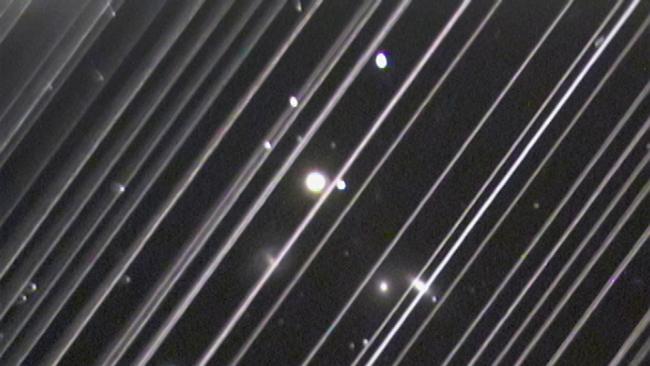 The satellites left trails of light in the night sky but residents reported seeing a slow-moving line of lights. Picture: Victoria Girgis/Lowell Observatory