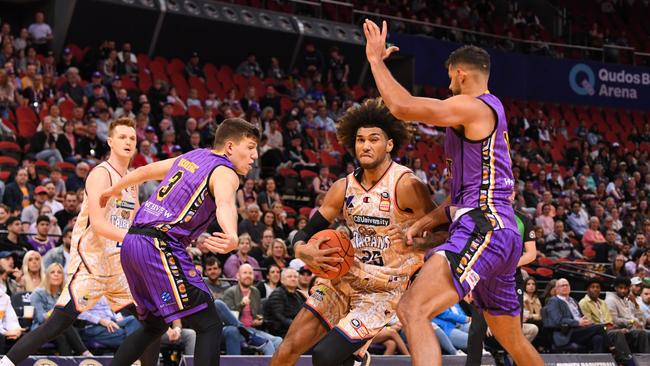 Keanu Pinder drives to the rim during the round three NBL match between Sydney Kings and Cairns Taipans at Qudos Bank Arena, on October 14, 2022, in Sydney, (Photo by Nathan Hopkins/Getty Images)