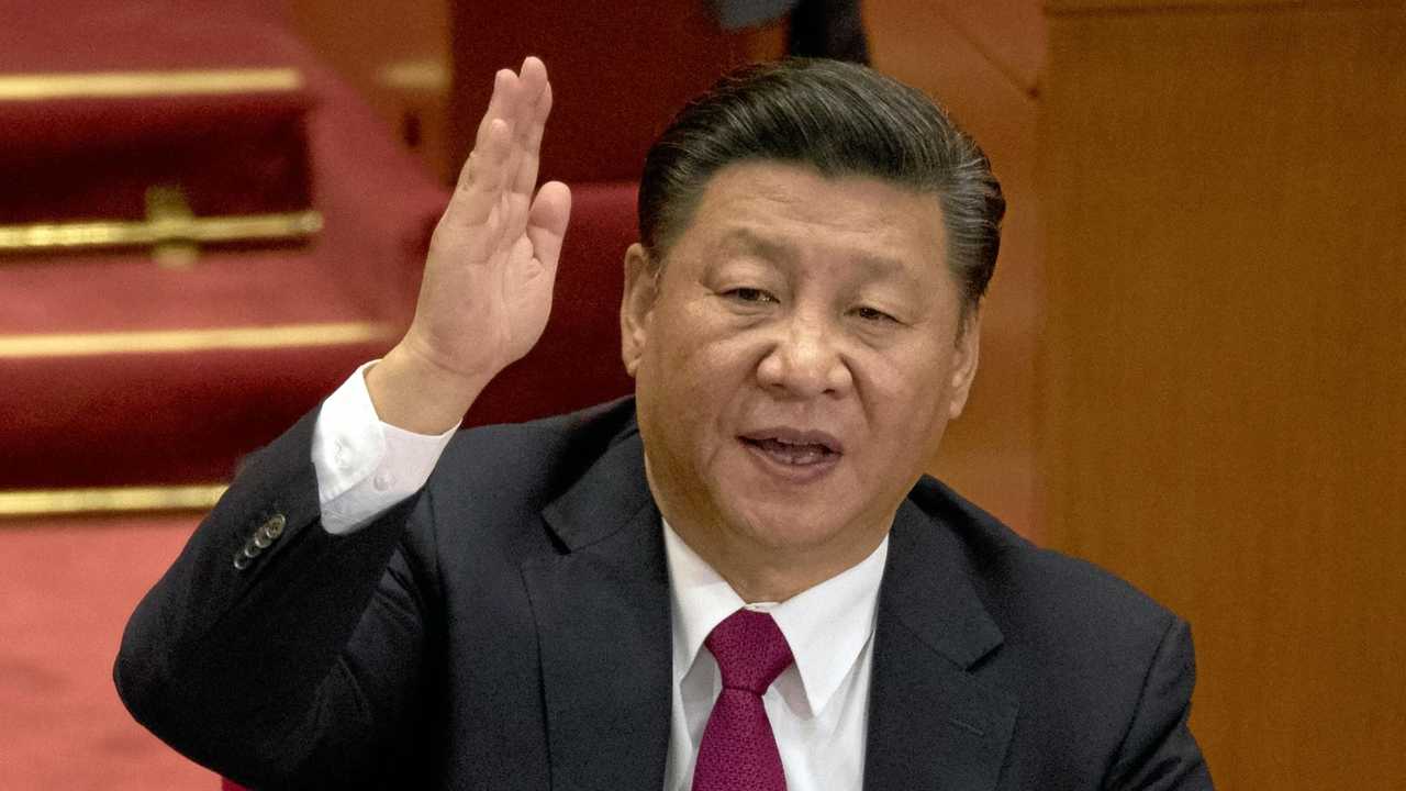 Chinese President Xi Jinping raises his hand to show approval of a work report during the closing ceremony for the 19th Party Congress at the Great Hall of the People in Beijing, China, Tuesday, Oct. 24, 2017. The ruling Communist Party on Tuesday formally lifted Xi Jinping's status to China's most powerful ruler in decades, setting the stage for the authoritarian leader to tighten his grip over the country while pursuing an increasingly muscular foreign policy and military expansion. (AP Photo/Ng Han Guan). Picture: Ng Han Guan