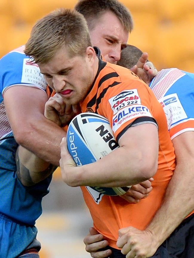 Cameron Munster playing for the Brisbane Tigers in 2014. Picture: Bradley Kanaris/Getty Images