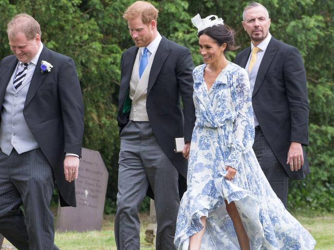 Meghan Markle and Prince Harry arriving for the wedding of Celia McCorquodale in Stoke Rochford, UK.