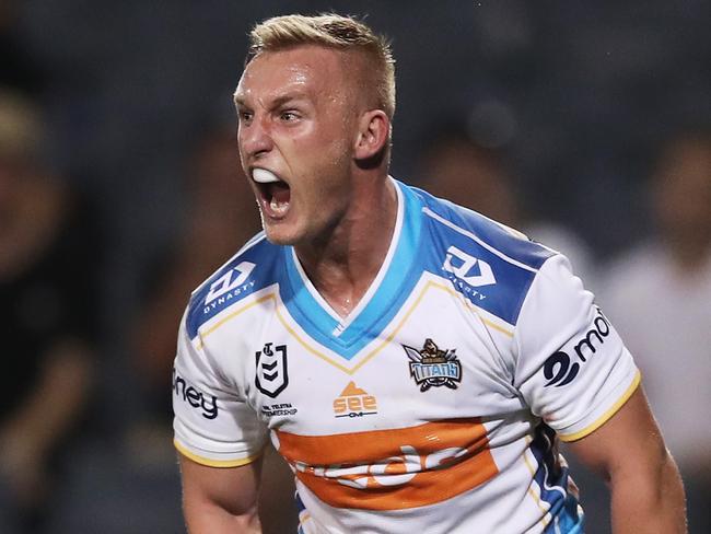 SYDNEY, AUSTRALIA - MAY 08: Tanah Boyd of the Titans celebrates scoring a try during the round nine NRL match between the Wests Tigers and the Gold Coast Titans at Campbelltown Sports Stadium, on May 08, 2021, in Sydney, Australia. (Photo by Matt King/Getty Images)