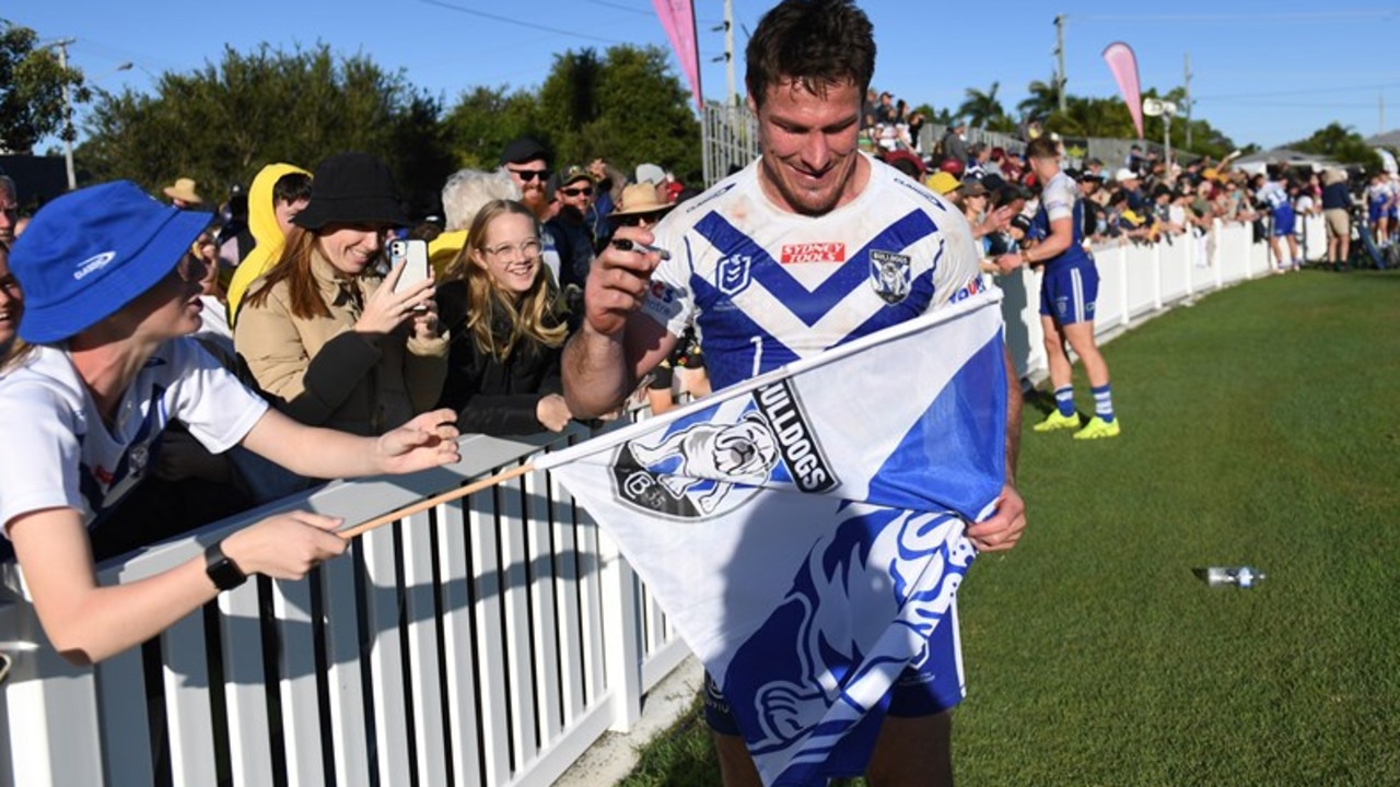 18/05/2023 - Then Bulldogs captain Josh Jackson signs autographs after last year’s game with the Cowboys at Salter Oval. Picture: NRL Photos