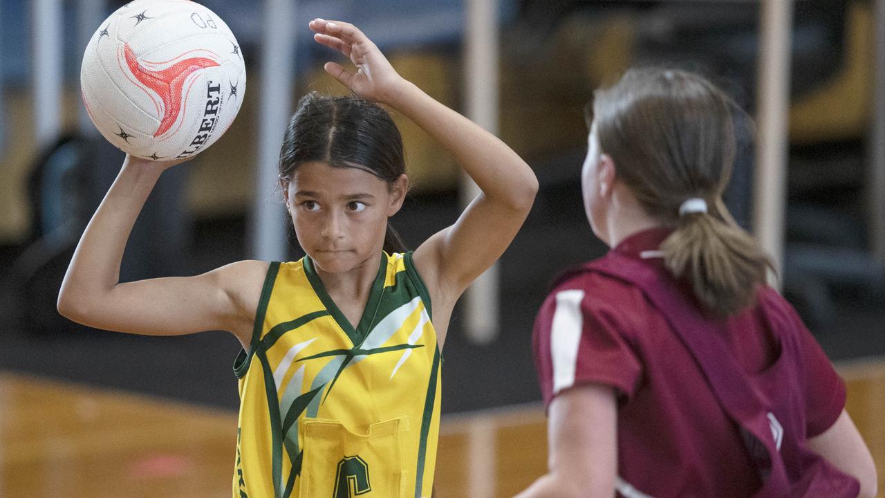 Celebrating the state’s school-based little legends. News photographer Simon Cross captures the focus and determination during a passage of play in the Metro Year 6 Division 1 competition, between Adelaide South East and Para Districts (in yellow).