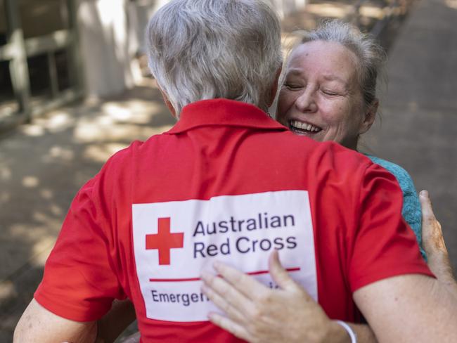 South Lismore resident Vicky Harvey greets Australian Red Cross volunteer Jenny Dowell at the Recovery Centre in Lismore in the immediate aftermath of Tropical Cyclone Alfred which impacted Northern Rivers, NSW and southern QLD. In 2022 during the devastating floods, Vicky needed to be rescued from her veranda after the water as she sat on a chair atop a table of her first-floor apartment. The flood waters reached previously unseen levels.  During Tropical Cyclone Alfred, Vicky was prepared in advance and decided to leave before the Richmond River began seriously flooding. After being supported by ARC volunteers at the Recovery Centre after T/C Alfred, Vicky is now inspired to join ARC as a volunteer herself.