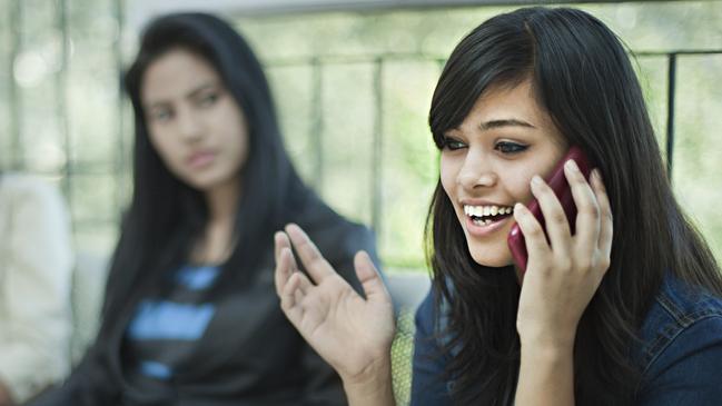 Don’t watch videos, listen to music and take loud phone calls on public transport without using headphones. Picture: iStock