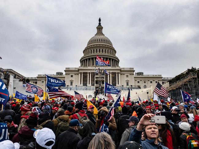 Donald Trump’s supporters prepare to storm the US Capitol on January 6. Picture: Samuel Corum (Getty Images)