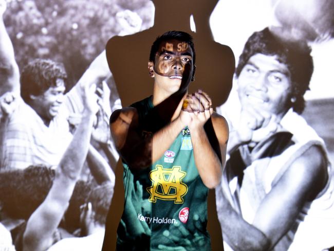 Nt Thunder's  Shannon Rioli will play his 100th NTFL match in the Grand Final against Wanderers. Photos of his uncles and father, who were all champion St Marys players.