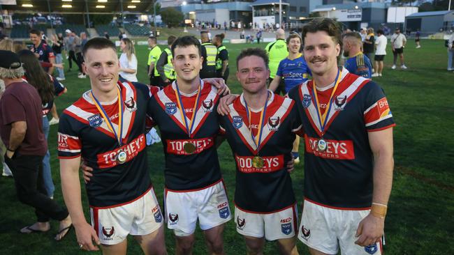 Douch, Elliott, Besley and Clements after the game. Picture: Sue Graham