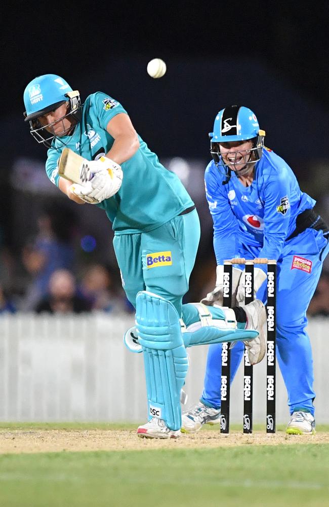 Delissa Kimmince (left) of the Heat in action during the WBBL match between the Brisbane Heat and Adelaide Strikers at Harrup Park in Mackay, Saturday, November 2, 2019. Picture: AAP Image/Darren England