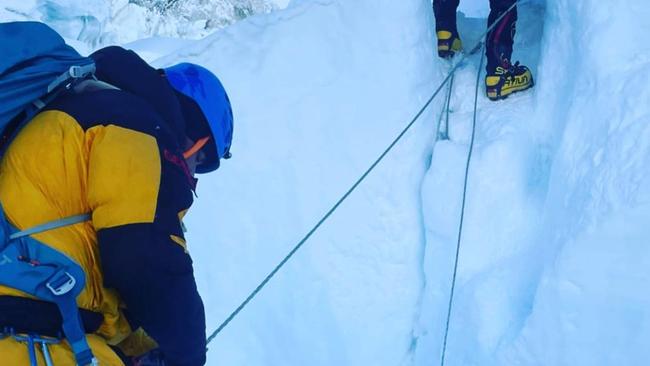 His last series of posts had been pictures taken along his climb including walking across a ladder on Khumbu Icefall.