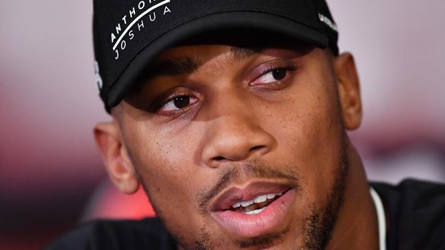 Anthony Joshua speaks during a press conference in London.