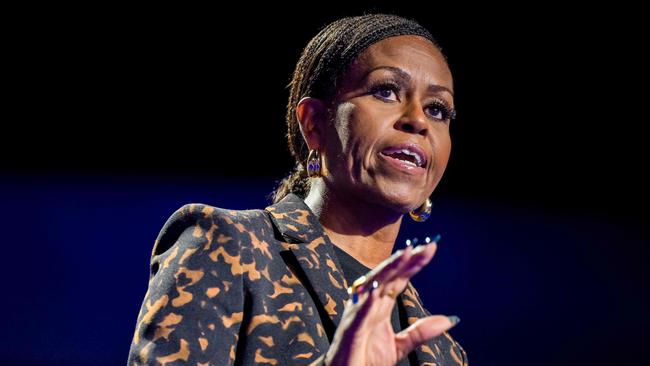 KALAMAZOO, MICHIGAN - OCTOBER 26: Former first lady Michelle Obama speaks ahead of the arrival of Democratic presidential nominee, U.S. Vice President Kamala Harris during a campaign rally at the Wings Event Center on October 26, 2024 in Kalamazoo, Michigan. Vice President Harris will be campaigning today with former first lady Michelle Obama in the battleground swing state of Michigan. With 10 days remaining, Harris continues campaigning against Republican presidential nominee, former U.S. President Donald Trump ahead of the November 5 election.   Brandon Bell/Getty Images/AFP (Photo by Brandon Bell / GETTY IMAGES NORTH AMERICA / Getty Images via AFP)