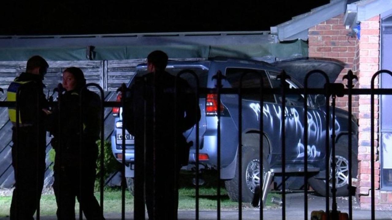 Car sprayed with ominous message crashes into Mill Park home