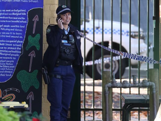 A male was stabbed at Plunkett St Public School. Police at the scene . Picture John Grainger