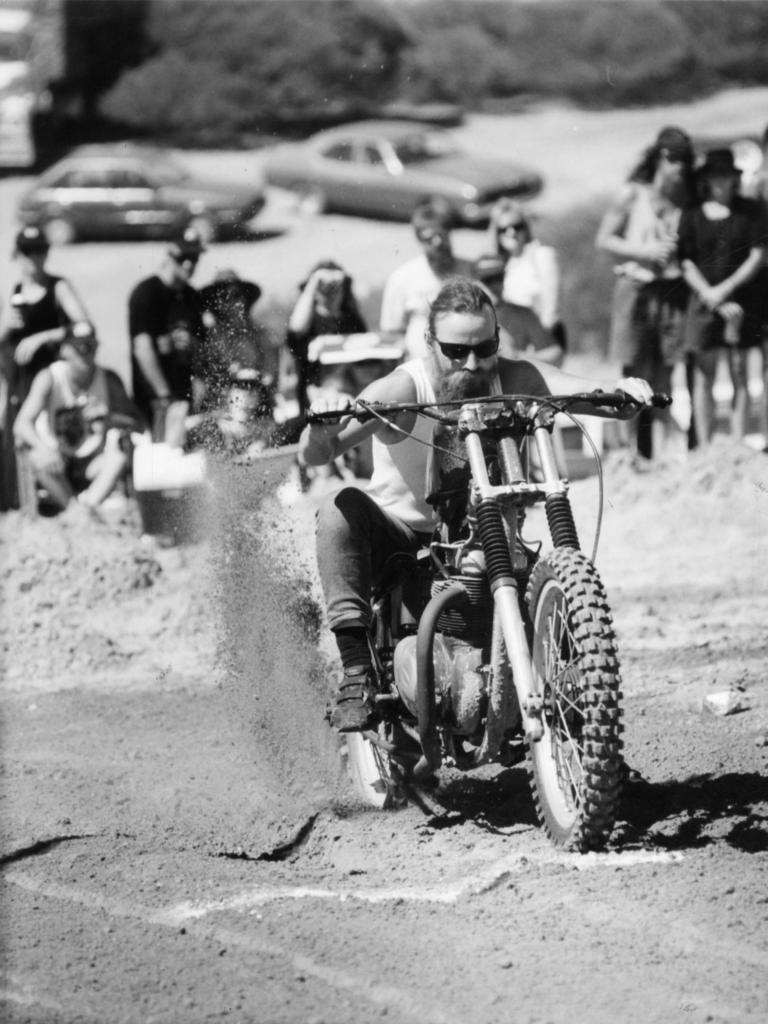 Kenny Forbes on his BSA motorcycle at the sand drags at Ponde rock music festival, held by the Hell's Angels Motorcycle Club in Ponde near Mannum, SA, 19 Feb 1995.