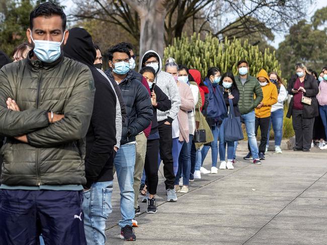MELBOURNE, AUSTRALIA - NewsWire Photos June 5, 2021: People queue for Covid Vaccination at Sandown Racecourse.Picture: NCA NewsWire / David Geraghty