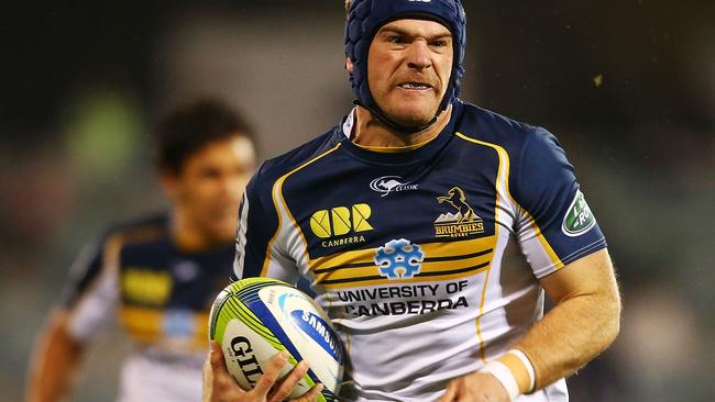 CANBERRA, AUSTRALIA - MAY 10: Pat McCabe of the Brumbies makes a line break during the round 13 Super Rugby match between the Brumbies and the Sharks at Canberra Stadium on May 10, 2014 in Canberra, Australia. (Photo by Mark Nolan/Getty Images)