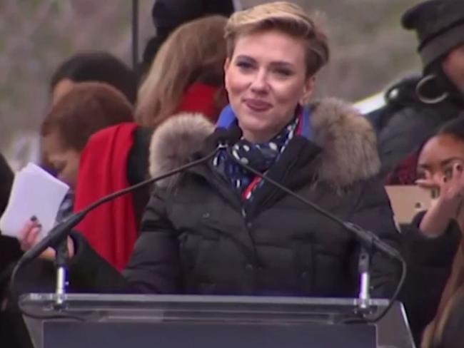 The activist threw her hands up after her mic was muted.