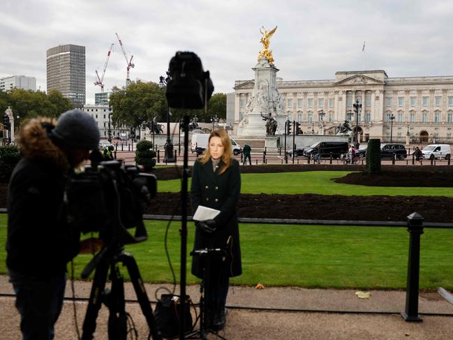 News crews are camped outside of Buckingham Palace as confusion reigns over the state of the Queen’s health. Picture: AFP