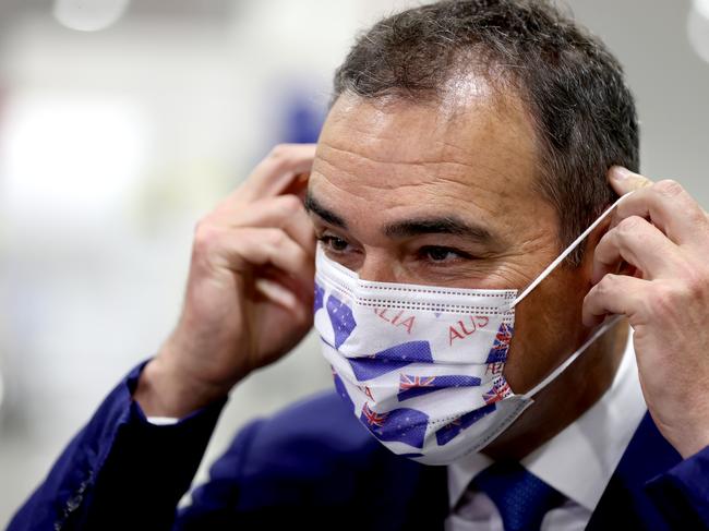 ADELAIDE, AUSTRALIA - NOVEMBER 30: South Australian Premier Steven Marshall poses for portrait with an Australia day mask made by Detmold Group on November 30, 2020 in Adelaide, Australia. South Australians are being urged to remain vigilant for COVID-19 symptoms and to get tested immediately if they have visited any locations deemed high risk after a man who is COVID-19 positive broke his required home quarantine and visited a number of locations in Adelaide. (Photo by Kelly Barnes/Getty Images)